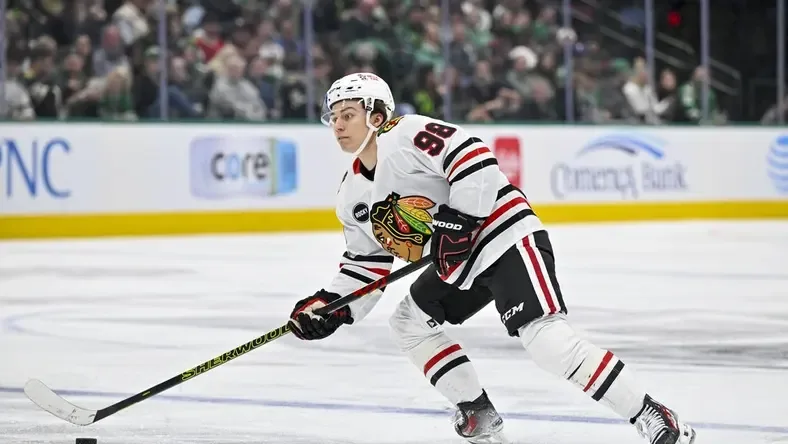 Connor Bedard carrying the puck for the Chicago Blackhawks